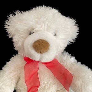 Doh Bear the white fluffy teddy bear with a red bow